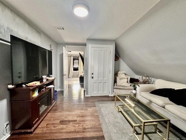57 Houston St, New Haven, CT 06513 - living area with wood finished floors and vaulted ceiling