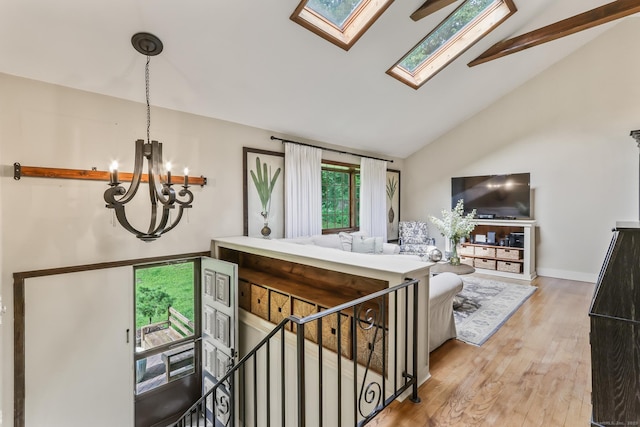 16 Pond Crest Rd, Danbury, CT 06811 - living room with a chandelier, wood finished floors, high vaulted ceiling, and a skylight