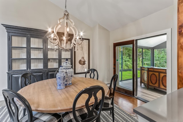 16 Pond Crest Rd, Danbury, CT 06811 - dining room featuring a chandelier, lofted ceiling, and wood finished floors