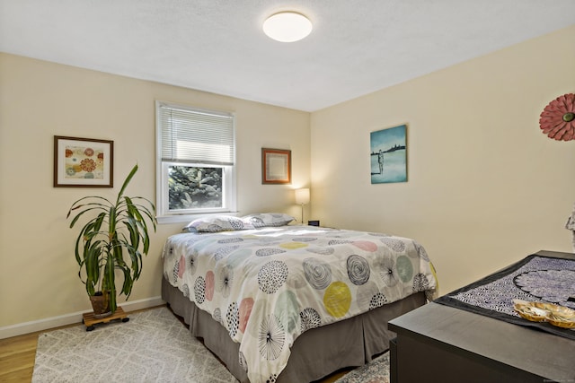 420 Newcomb Rd, North Kingston, Rhode Island, RI 02852 - bedroom featuring wood finished floors and baseboards