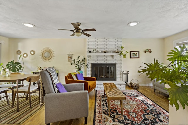 420 Newcomb Rd, North Kingston, Rhode Island, RI 02852 - living area featuring ceiling fan, a fireplace, wood finished floors, and recessed lighting