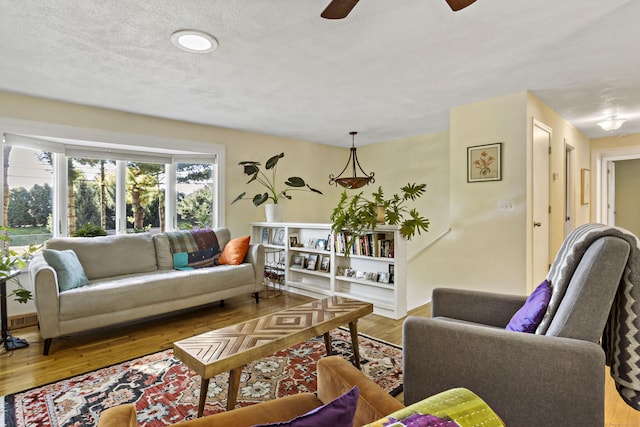 420 Newcomb Rd, North Kingston, Rhode Island, RI 02852 - living room featuring wood finished floors and ceiling fan