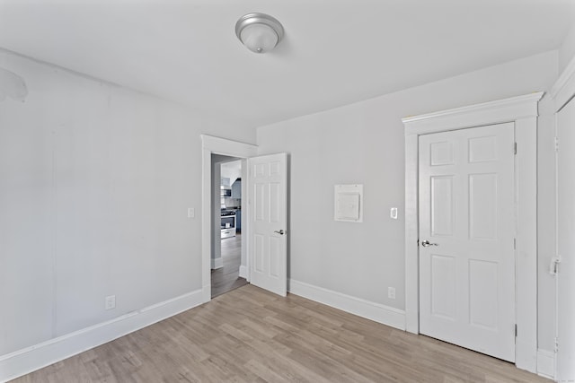 36 Taylor Ave, Norwalk, CT 06854 - unfurnished bedroom featuring light wood-type flooring