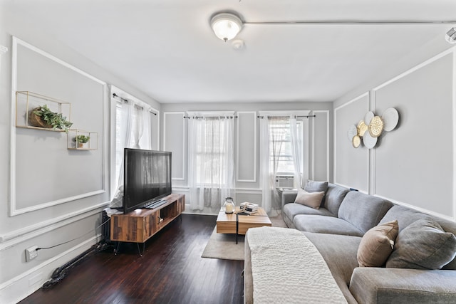 36 Taylor Ave, Norwalk, CT 06854 - living area featuring dark wood-style flooring and a decorative wall