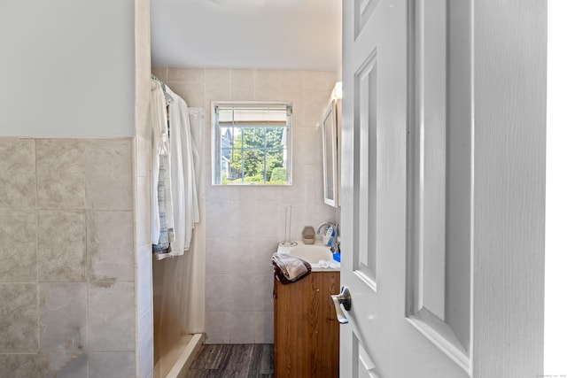 36 Taylor Ave, Norwalk, CT 06854 - full bath with tile walls, vanity, and a shower with curtain