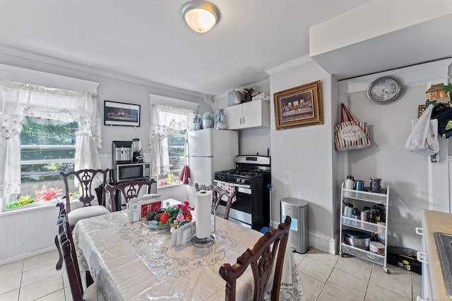 36 Taylor Ave, Norwalk, CT 06854 - dining area with light tile patterned flooring and ornamental molding