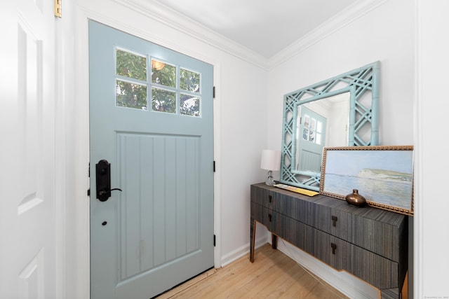 33 Ridgeley St, Darien, CT 06820 - entrance foyer featuring light wood-style floors and crown molding
