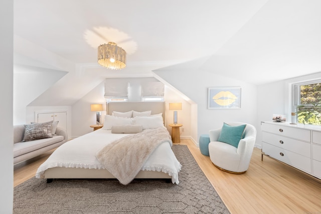 33 Ridgeley St, Darien, CT 06820 - bedroom featuring light wood-style floors and vaulted ceiling
