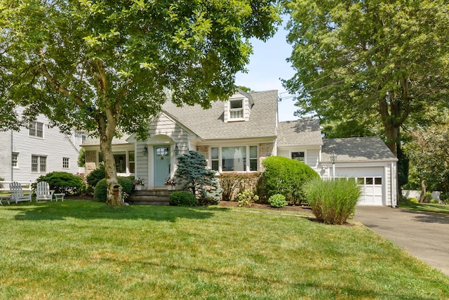 33 Ridgeley St, Darien, CT 06820 - cape cod home featuring a shingled roof, driveway, a front yard, and an attached garage