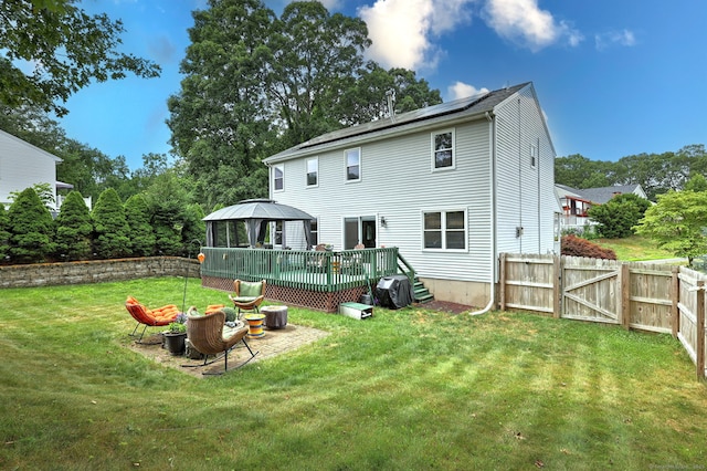 68 Benjamin Rd, East Haven, CT 06513 - back of house with a gazebo and a gate
