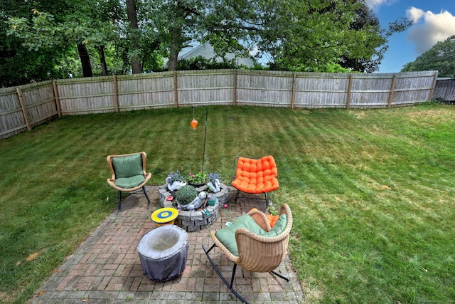 68 Benjamin Rd, East Haven, CT 06513 - fenced backyard featuring a patio area