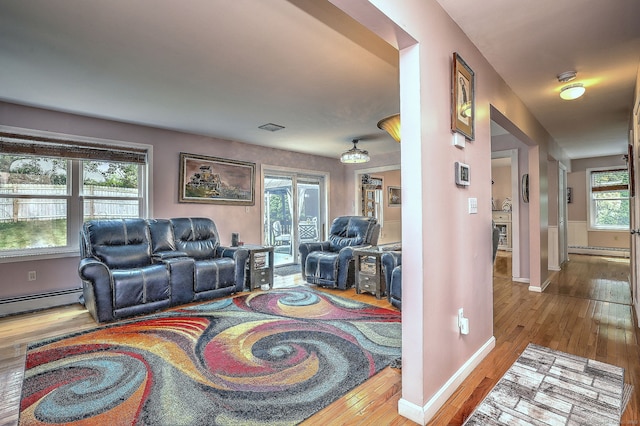 68 Benjamin Rd, East Haven, CT 06513 - living room with a baseboard radiator, hardwood / wood-style flooring, and a baseboard heating unit