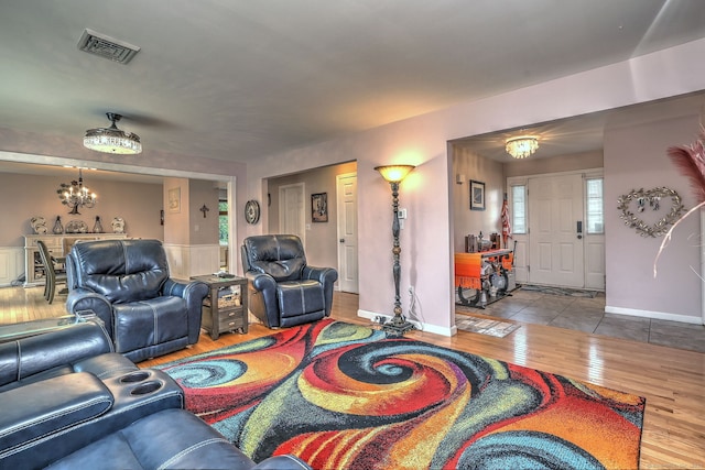 68 Benjamin Rd, East Haven, CT 06513 - living room with a chandelier and wood finished floors