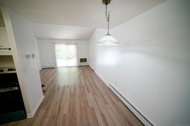 50 E Hill Rd Apt 2H, Canton, CT 06019 - unfurnished dining area featuring baseboard heating, light wood-style flooring, and lofted ceiling