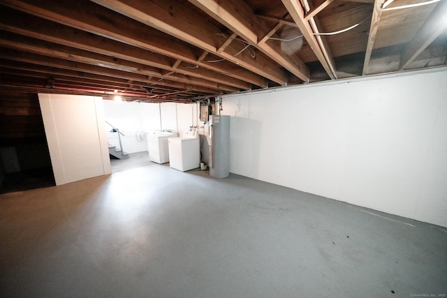 50 E Hill Rd Apt 2H, Canton, CT 06019 - unfinished basement featuring washing machine and clothes dryer and water heater