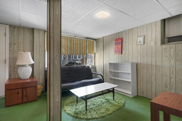 1176 Ocean Ave, New London, CT 06320 - sitting room with carpet floors, a paneled ceiling, and wood walls