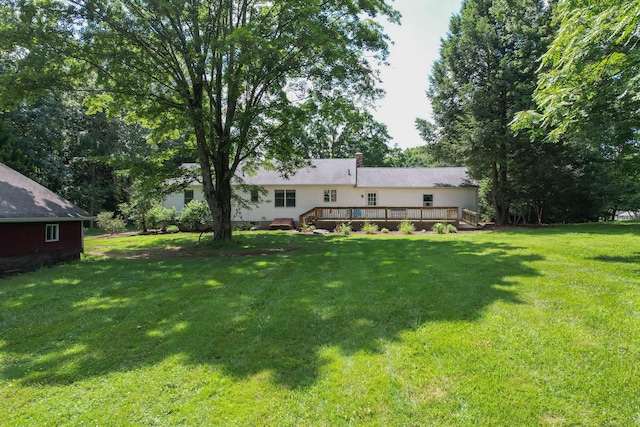 229 Flanders Rd, Southington, CT 06489 - view of green lawn featuring a wooden deck