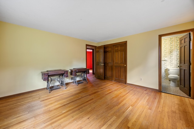 229 Flanders Rd, Southington, CT 06489 - bedroom with wood finished floors, a closet, and ensuite bathroom