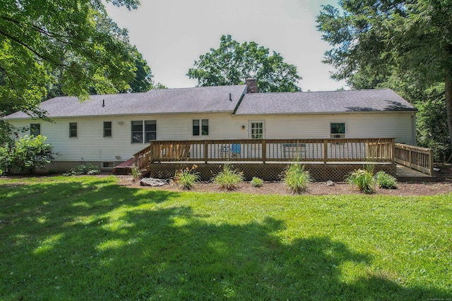 229 Flanders Rd, Southington, CT 06489 - back of property featuring a chimney, a deck, and a lawn