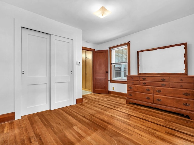 79 E Pattagansett Rd, East Lyme, CT 06357 - unfurnished bedroom featuring light wood-style floors and a closet