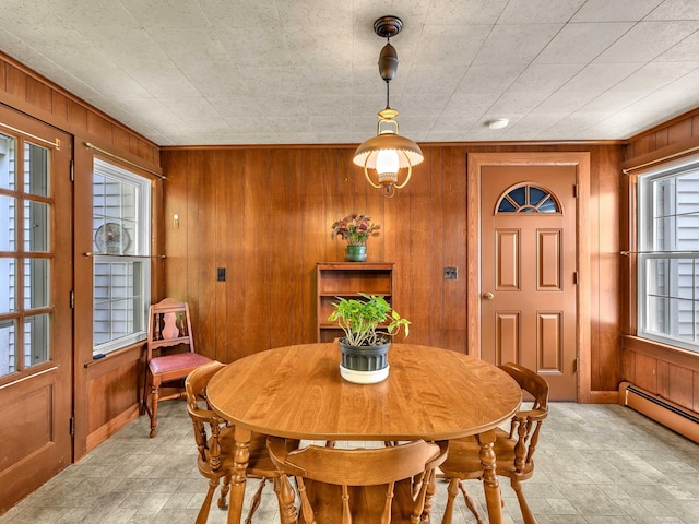 79 E Pattagansett Rd, East Lyme, CT 06357 - dining room with wood walls and a baseboard radiator