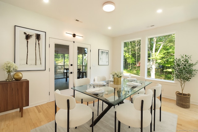 765 Durham Rd, Guilford, CT 06437 - dining space with light wood-style floors, recessed lighting, and french doors