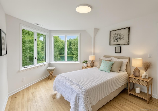 765 Durham Rd, Guilford, CT 06437 - bedroom featuring light wood-style flooring and baseboards