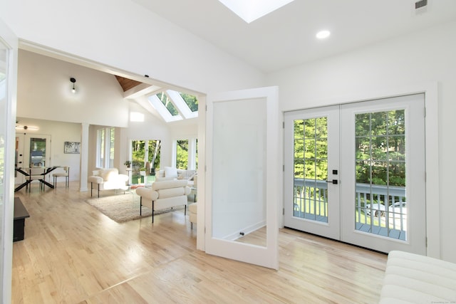 765 Durham Rd, Guilford, CT 06437 - living room with a skylight, wood finished floors, and french doors