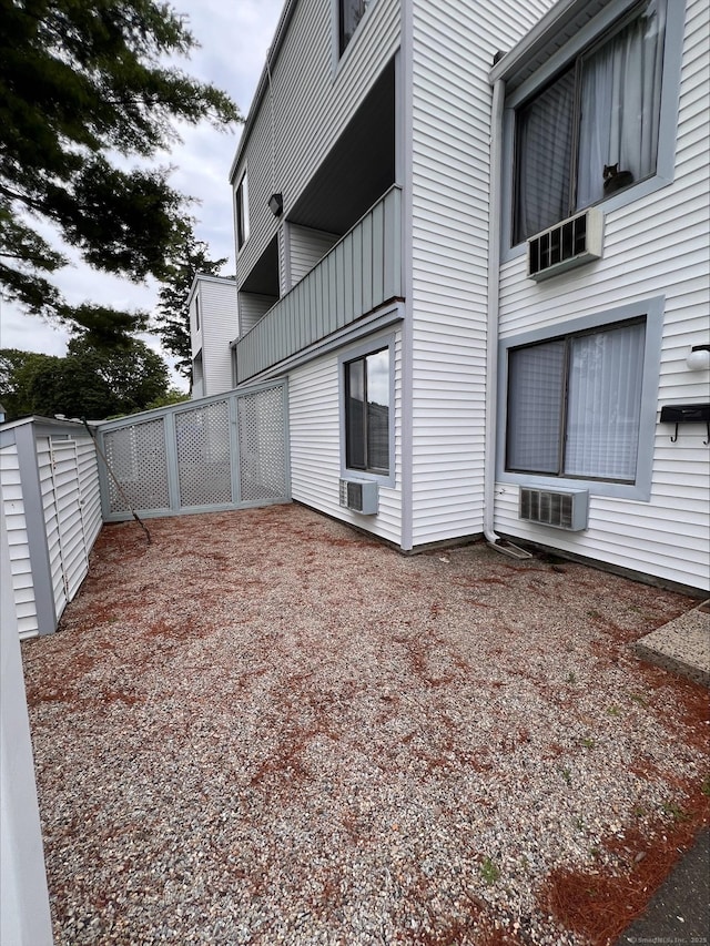 8 Hamre Ln Unit A, Branford, CT 06405 - view of home's exterior with a wall mounted AC
