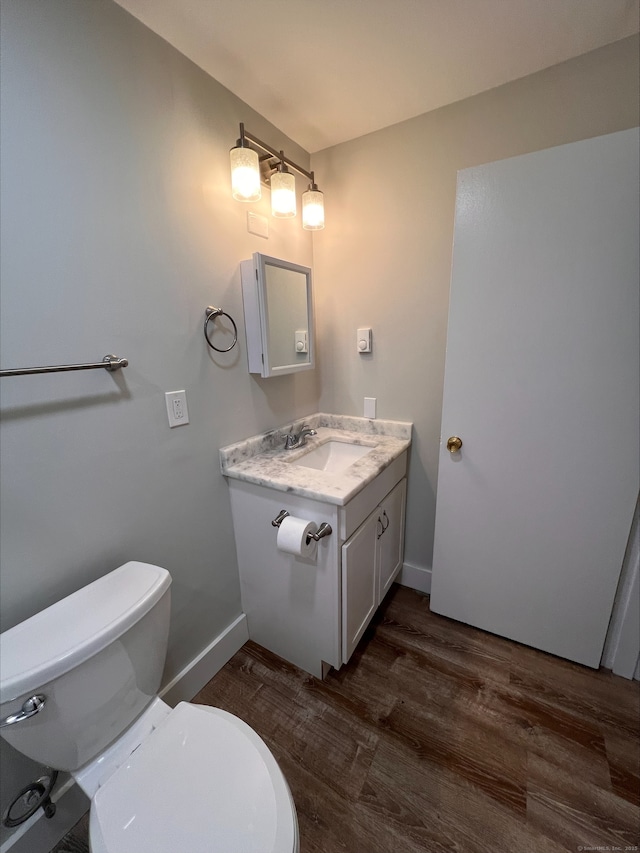 8 Hamre Ln Unit A, Branford, CT 06405 - half bath with vanity and wood finished floors