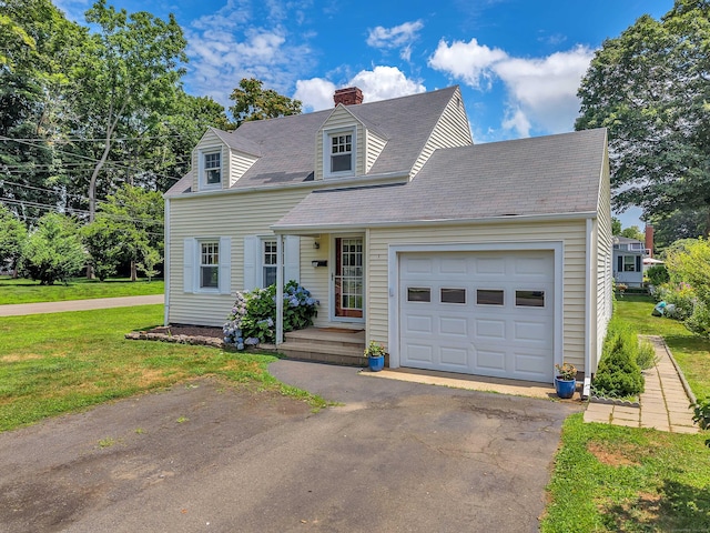 18 Lynde St, Old Saybrook, CT 06475 - cape cod-style house featuring asphalt driveway, an attached garage, a front lawn, a chimney, and a shingled roof