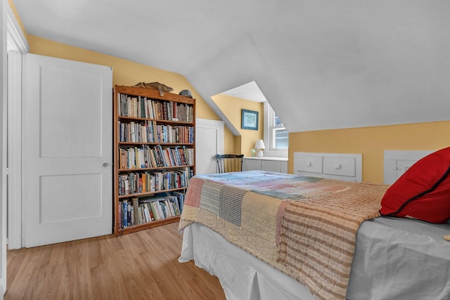 18 Lynde St, Old Saybrook, CT 06475 - bedroom featuring wood finished floors and vaulted ceiling