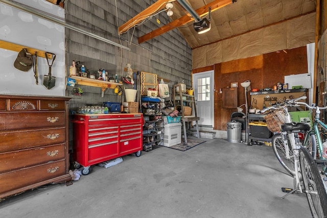 18 Lynde St, Old Saybrook, CT 06475 - garage with a workshop area and a garage door opener