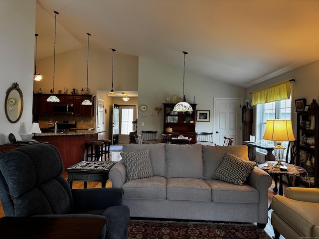 4 Skylark Ln Unit 4, Killingly, CT 06239 - living area with high vaulted ceiling and healthy amount of natural light