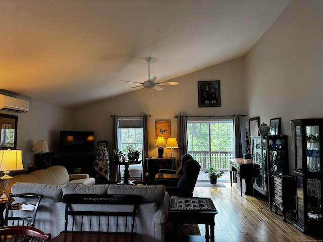 4 Skylark Ln Unit 4, Killingly, CT 06239 - living room with lofted ceiling, plenty of natural light, a wall mounted air conditioner, wood finished floors, and a ceiling fan