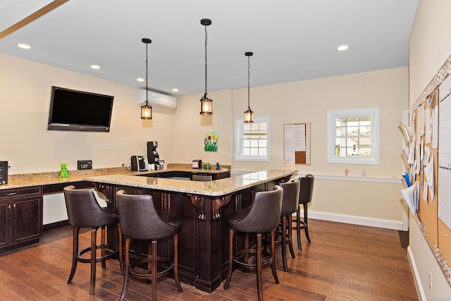 4 Skylark Ln Unit 4, Killingly, CT 06239 - indoor bar featuring a wall unit AC, dark wood-type flooring, pendant lighting, and recessed lighting