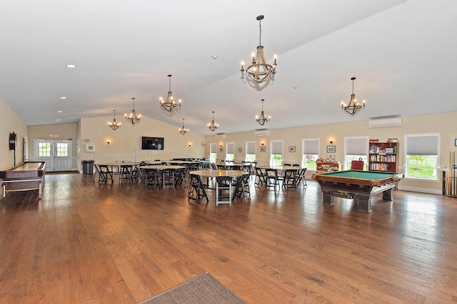 4 Skylark Ln Unit 4, Killingly, CT 06239 - rec room featuring pool table, a chandelier, lofted ceiling, wood finished floors, and a wall mounted air conditioner