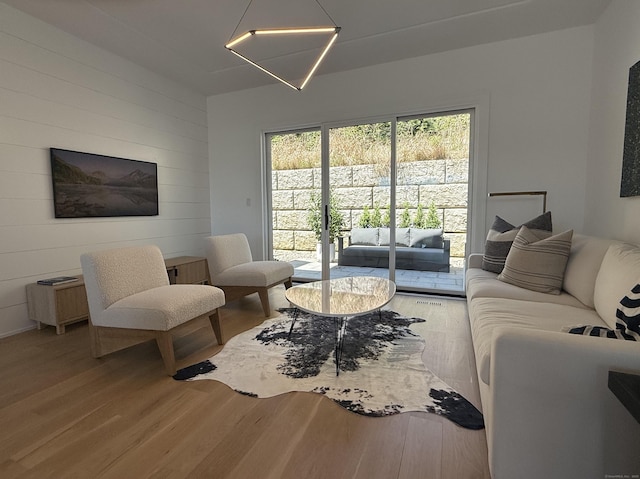785 Post Rd E Unit 301, Westport, CT 06880 - living area featuring wood finished floors and wooden walls