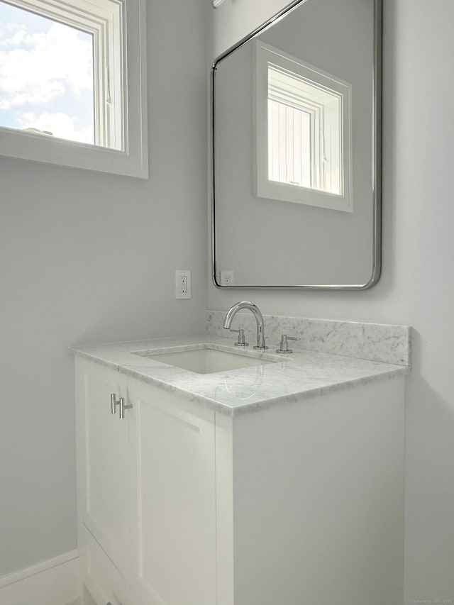 785 Post Rd E Unit 301, Westport, CT 06880 - bathroom with vanity and plenty of natural light