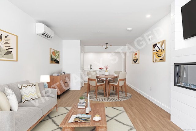 44 Williams St, Stonington, CT 06379 - living area with a wall mounted AC, light wood finished floors, and a fireplace