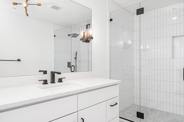 44 Williams St, Stonington, CT 06379 - bathroom featuring vanity and a stall shower
