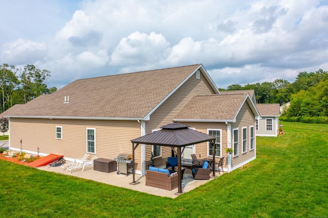 32 Mockingbird Dr Unit 32, Killingly, CT 06239 - rear view of property with a patio, outdoor lounge area, a yard, a gazebo, and roof with shingles