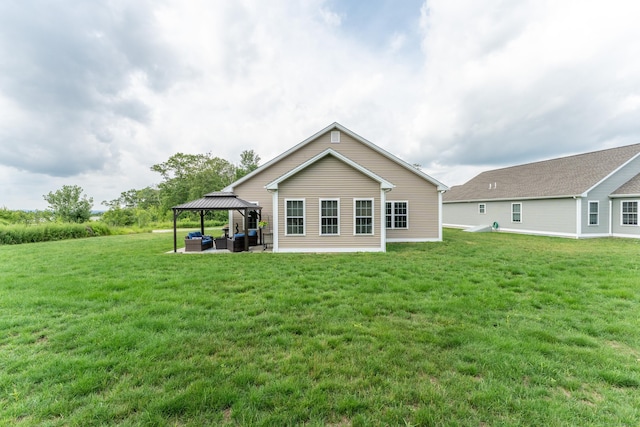 32 Mockingbird Dr Unit 32, Killingly, CT 06239 - rear view of house with outdoor lounge area, a gazebo, a yard, and a patio area