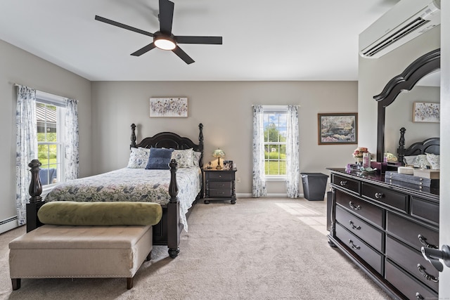 32 Mockingbird Dr Unit 32, Killingly, CT 06239 - bedroom with a wall mounted AC, carpet floors, and a ceiling fan