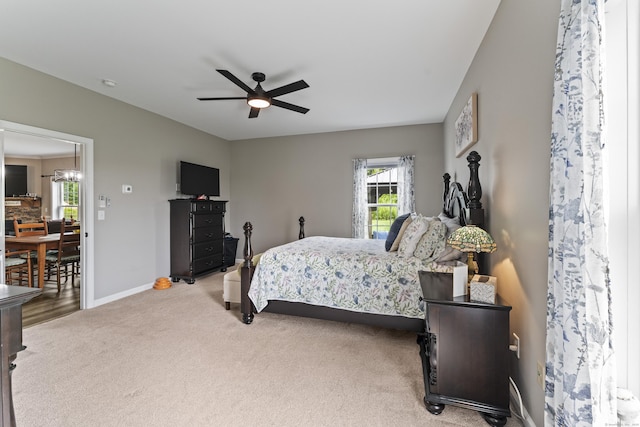 32 Mockingbird Dr Unit 32, Killingly, CT 06239 - bedroom featuring light carpet, ceiling fan, and a chandelier