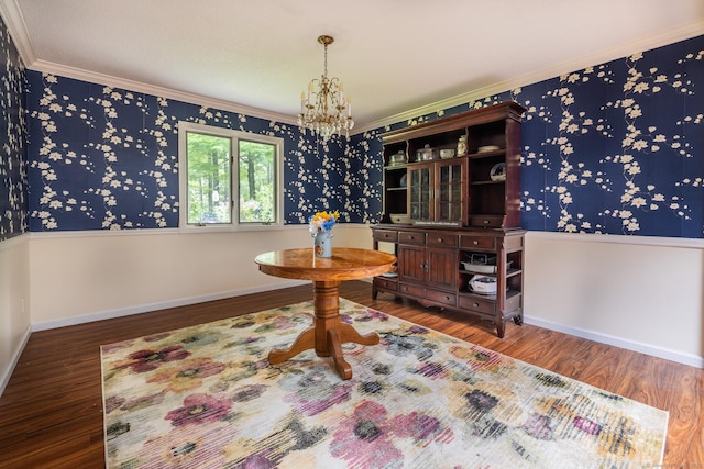 93 Kettletown Woods Rd, Southbury, CT 06488 - dining room with a chandelier, wood finished floors, ornamental molding, and wallpapered walls