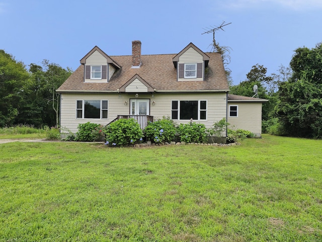 947 Ekonk Hill Rd, Voluntown, CT 06384 - cape cod home with a chimney, a front yard, and a shingled roof