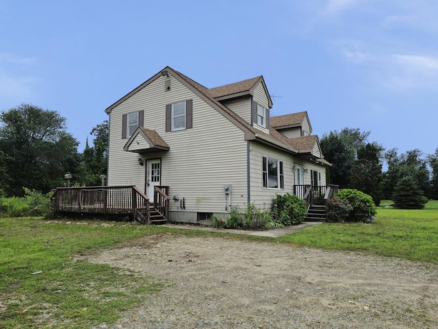 947 Ekonk Hill Rd, Voluntown, CT 06384 - rear view of house featuring a deck, roof with shingles, and a yard