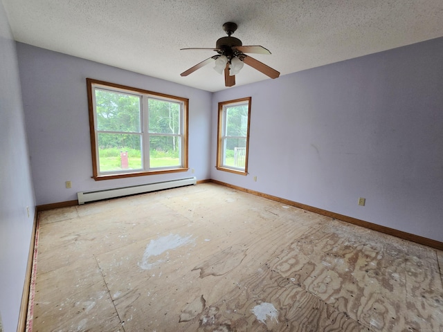 947 Ekonk Hill Rd, Voluntown, CT 06384 - empty room featuring baseboard heating, ceiling fan, and a textured ceiling