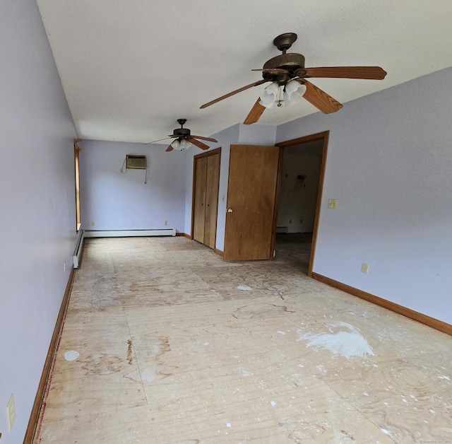 947 Ekonk Hill Rd, Voluntown, CT 06384 - spare room with ceiling fan, a wall mounted AC, and a baseboard radiator